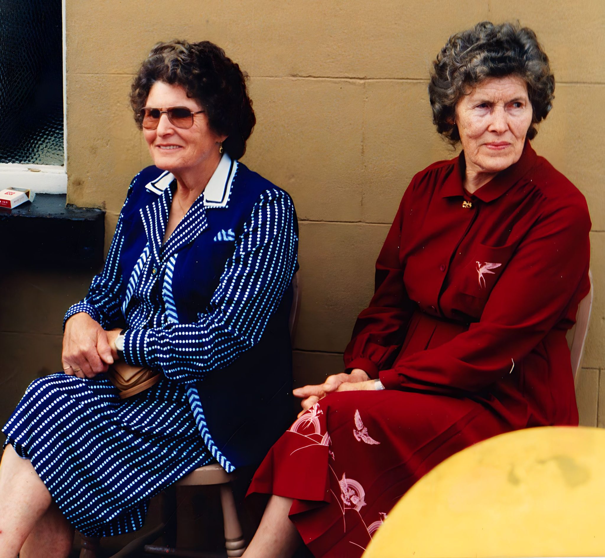 Colour photograph of the Keane sisters, Sarah and Rita at the Mayo Fleadh Cheoil Day in the 1980s. 